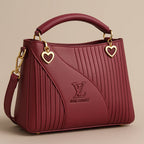 Elegant Maroon Louis Vuitton Handbag with Heart Charm Details - Razia Hijab