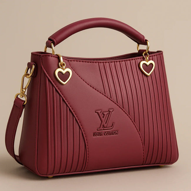 Elegant Maroon Louis Vuitton Handbag with Heart Charm Details Main Image