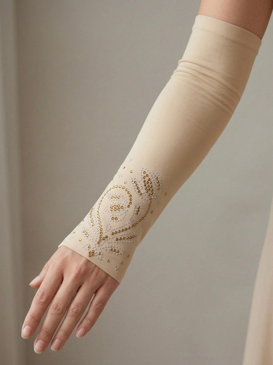 Embellished nude arm sleeves with gold and silver rhinestone detailing