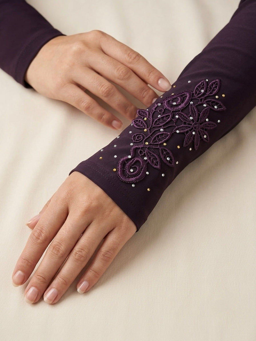 Embroidered plum purple arm sleeves with floral and rhinestone detailing